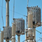 Porcelain high voltage insulators at a substation requiring SI-COAT 570 HVIC insulator coating to prevent contamination flashover