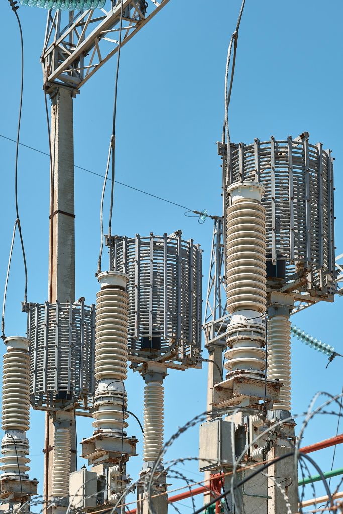 Porcelain high voltage insulators at a substation requiring SI-COAT 570 HVIC insulator coating to prevent contamination flashover